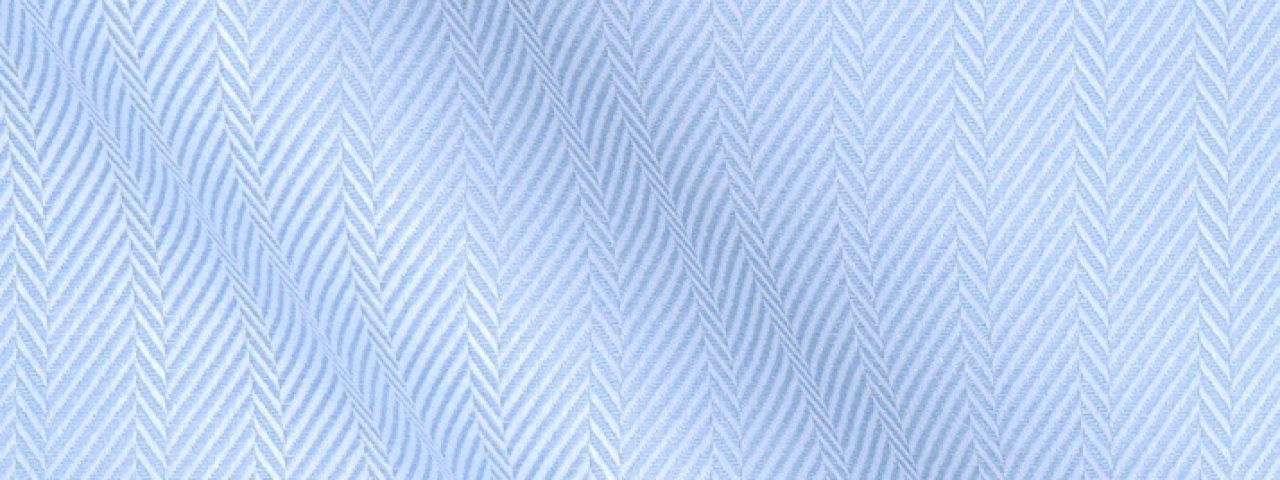 Blauer Stoff mit Fischgrat Muster